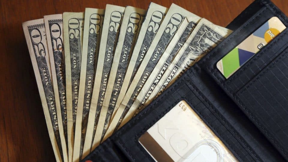 Wallet with money in it. (Image from Los Angeles Times)